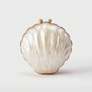 Luxe Rare Shell Clutch in Shimmering Cream